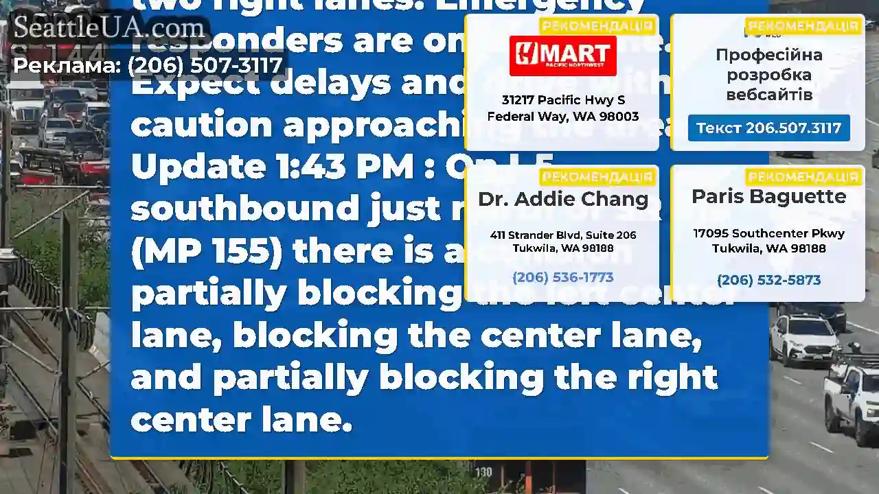 UPDATE: On southbound I-5 just north of SR 518